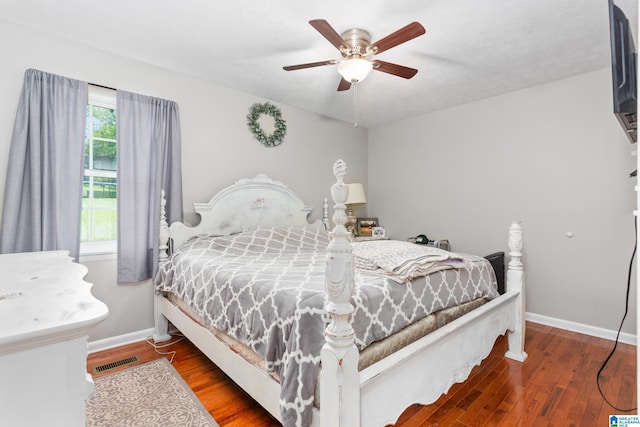 76 Pine Tree Ln, Alexandria, AL 36250 - bedroom with baseboards, wood finished floors, and a ceiling fan