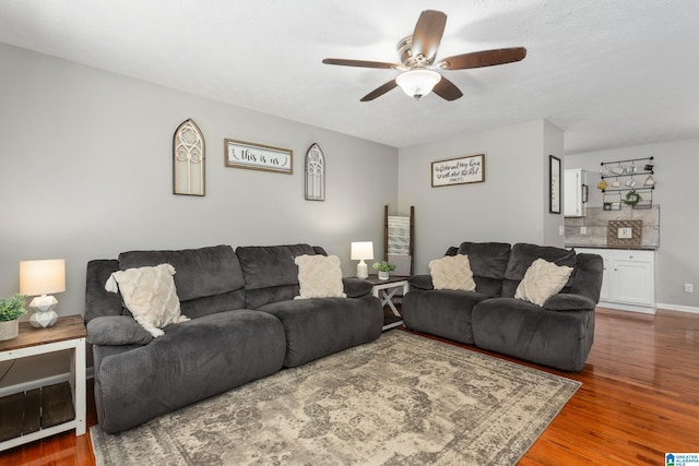 76 Pine Tree Ln, Alexandria, AL 36250 - living room with a ceiling fan and wood finished floors