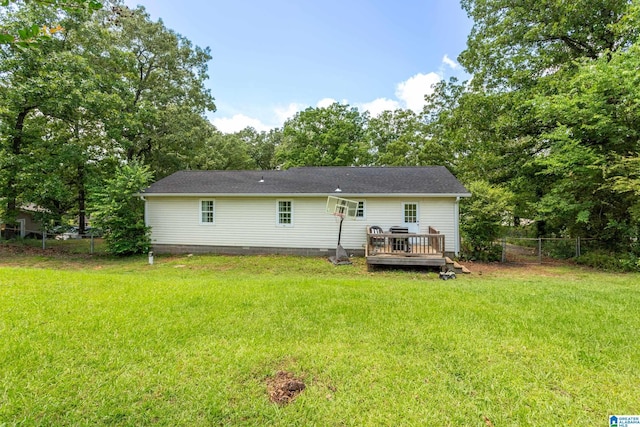 76 Pine Tree Ln, Alexandria, AL 36250 - back of property featuring a wooden deck and view of scattered trees