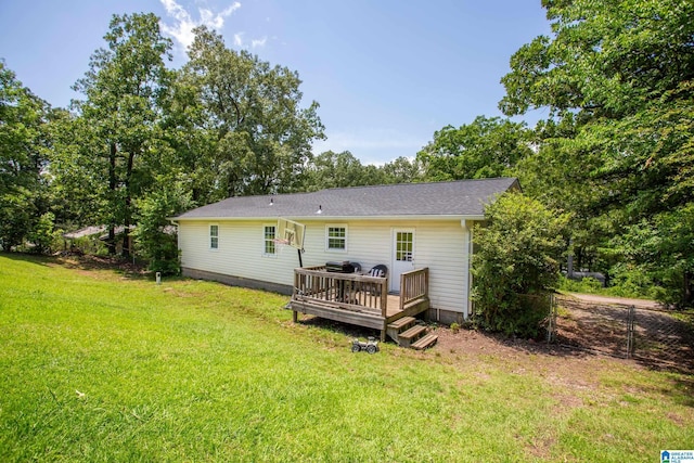 76 Pine Tree Ln, Alexandria, AL 36250 - rear view of property with a yard, a wooden deck, and view of scattered trees