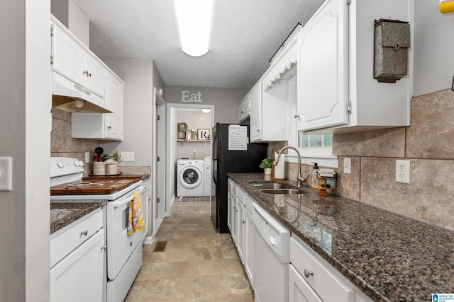 76 Pine Tree Ln, Alexandria, AL 36250 - kitchen with white appliances, a sink, washing machine and dryer, under cabinet range hood, and white cabinets