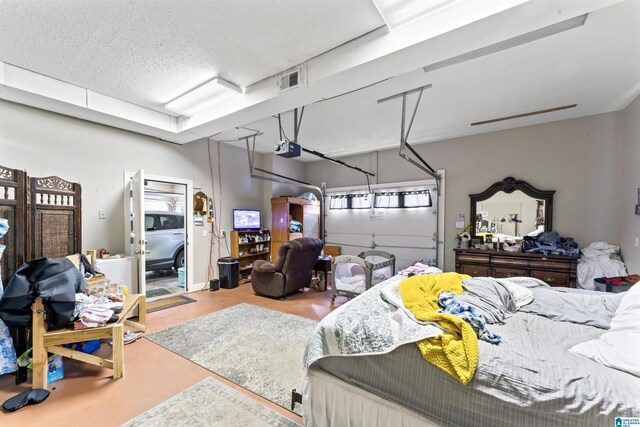 13688 Remlap Dr, Remlap, AL 35133 - bedroom featuring finished concrete flooring and a garage