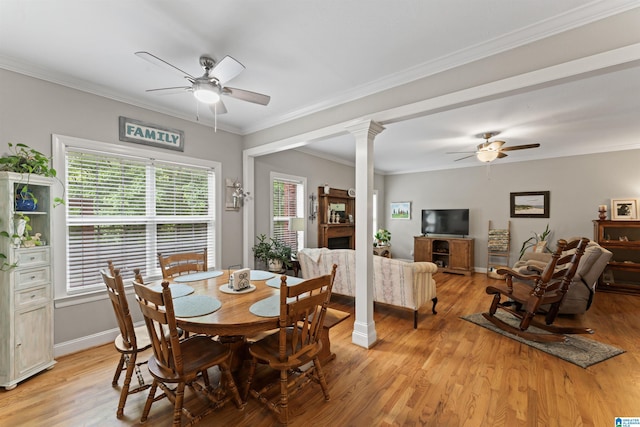 13688 Remlap Dr, Remlap, AL 35133 - dining area featuring a ceiling fan, light wood finished floors, ornamental molding, baseboards, and decorative columns