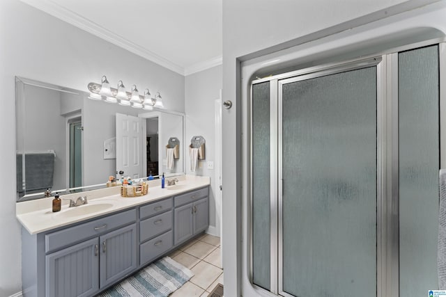 13688 Remlap Dr, Remlap, AL 35133 - bathroom with crown molding, a shower stall, tile patterned flooring, double vanity, and baseboards