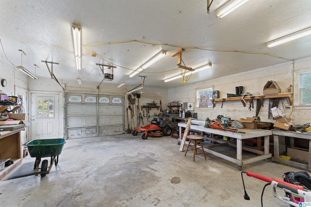 13688 Remlap Dr, Remlap, AL 35133 - garage featuring a workshop area and a garage door opener