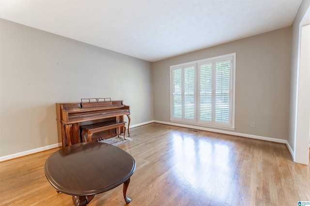 994 Comanche Trl, Anniston, AL 36206 - sitting room with baseboards and light wood-type flooring