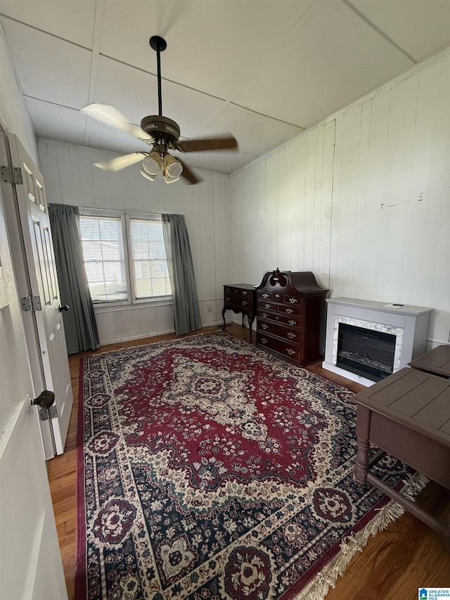 829 Higgs Dr, Adger, AL 35006 - living area with wood finished floors, ceiling fan, and a glass covered fireplace