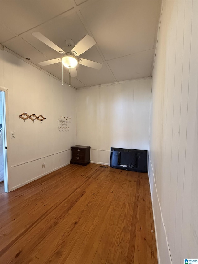 829 Higgs Dr, Adger, AL 35006 - unfurnished room with wood finished floors, ceiling fan, and a paneled ceiling