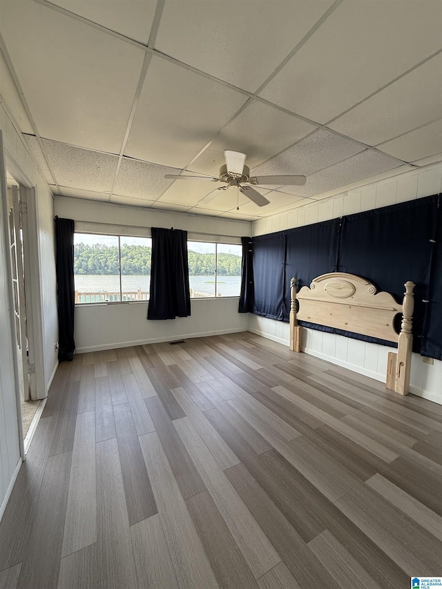 829 Higgs Dr, Adger, AL 35006 - unfurnished bedroom with a drop ceiling, wood finished floors, baseboards, and ceiling fan