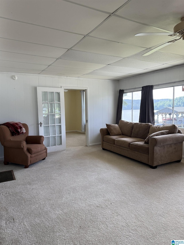 829 Higgs Dr, Adger, AL 35006 - carpeted living room with a ceiling fan and a paneled ceiling