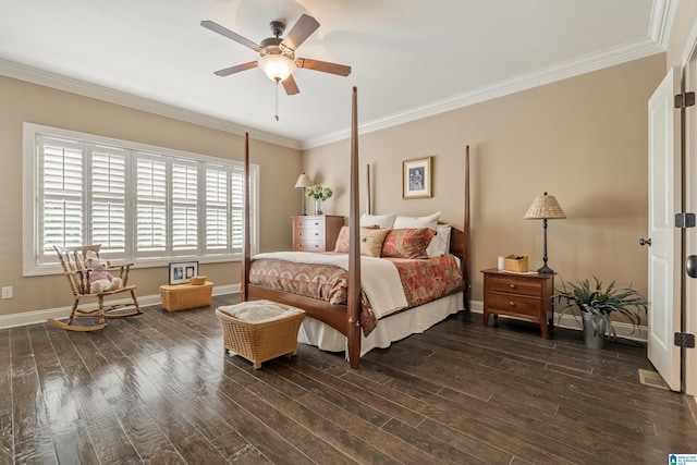 bedroom with dark wood finished floors, baseboards, crown molding, and a ceiling fan