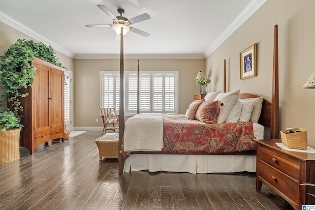 bedroom featuring multiple windows, wood-type flooring, ornamental molding, and a ceiling fan