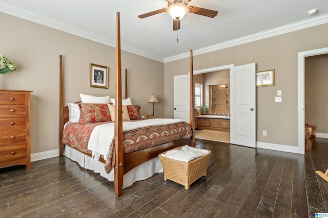 bedroom with ornamental molding, dark wood-style floors, baseboards, ensuite bathroom, and ceiling fan