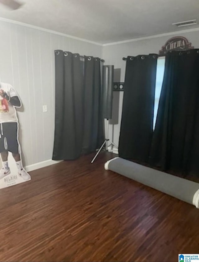 906 30th St, Phenix City, AL 36867 - unfurnished room with dark wood finished floors and ornamental molding