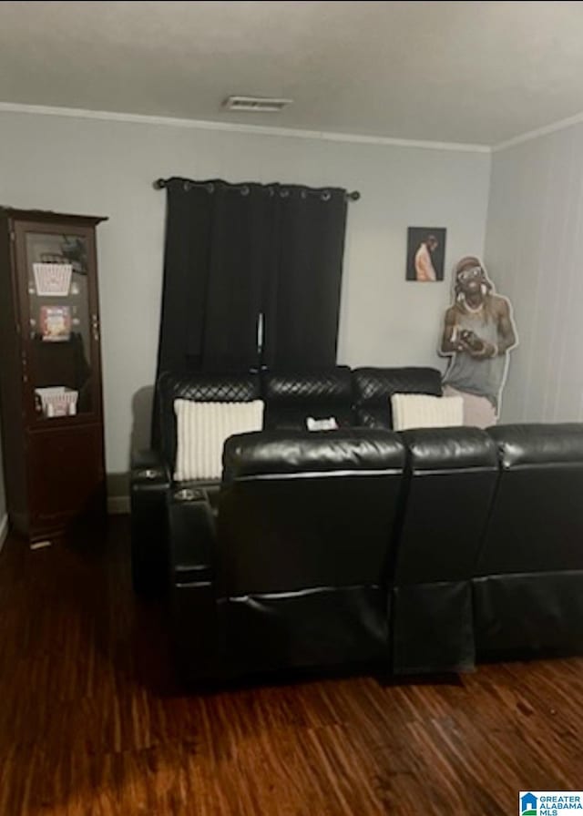 906 30th St, Phenix City, AL 36867 - home theater room with crown molding and dark wood-type flooring