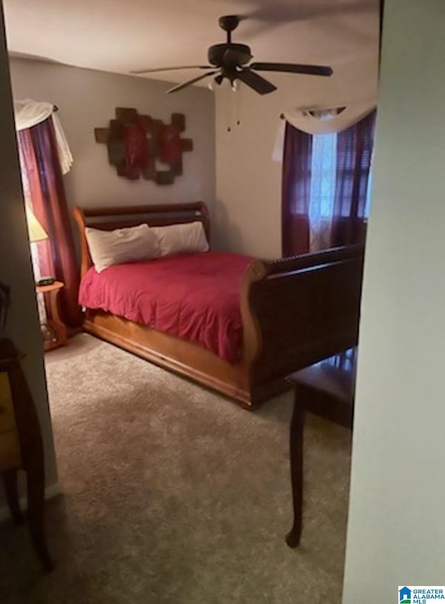 906 30th St, Phenix City, AL 36867 - bedroom with carpet flooring and a ceiling fan
