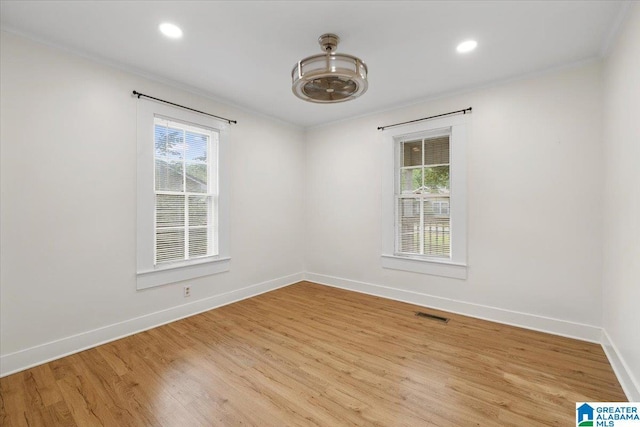 401 W 3rd Ave, Oneonta, AL 35121 - unfurnished room featuring ornamental molding, light wood finished floors, baseboards, and recessed lighting