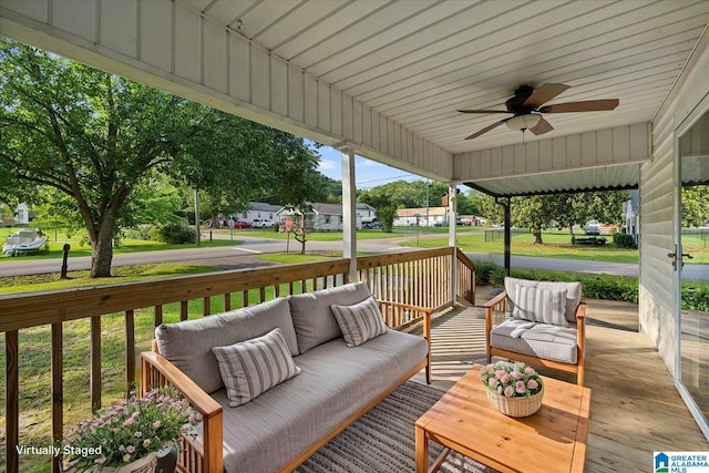401 W 3rd Ave, Oneonta, AL 35121 - deck with an outdoor living space and a ceiling fan