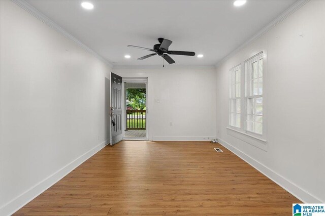 401 W 3rd Ave, Oneonta, AL 35121 - spare room with ornamental molding, recessed lighting, baseboards, a ceiling fan, and light wood-style flooring