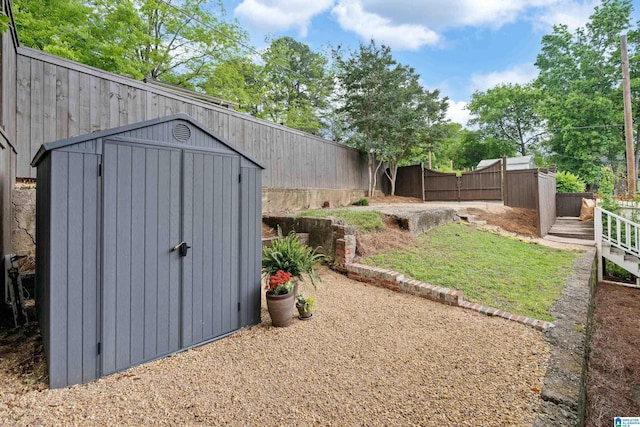 view of shed featuring a fenced backyard