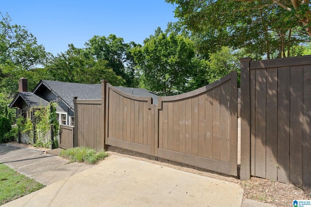 gate with fence and a patio