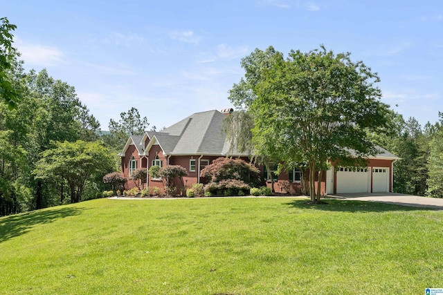 175 Sunhill Rd, Remlap, AL 35133 - view of front of house with a garage, a front lawn, driveway, and roof with shingles