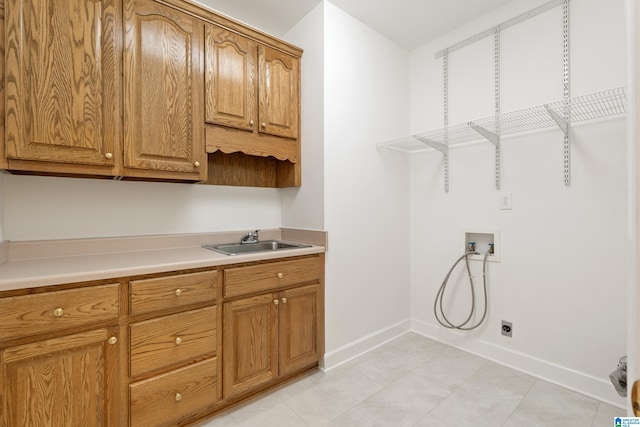 175 Sunhill Rd, Remlap, AL 35133 - laundry room with washer hookup, cabinet space, electric dryer hookup, baseboards, and light tile patterned flooring
