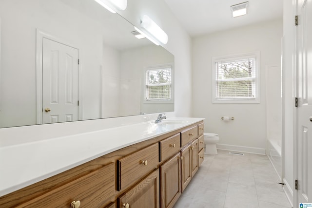 175 Sunhill Rd, Remlap, AL 35133 - bathroom with toilet, vanity, baseboards, tile patterned floors, and a tub to relax in