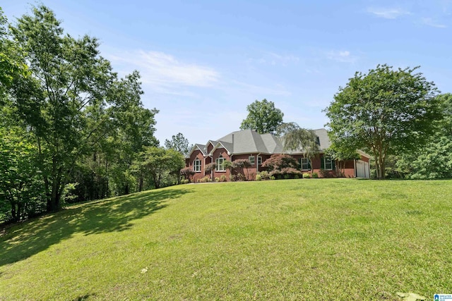175 Sunhill Rd, Remlap, AL 35133 - view of grassy yard with a garage