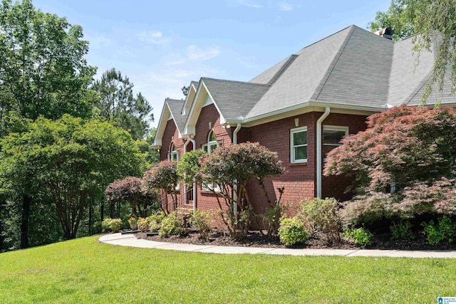 175 Sunhill Rd, Remlap, AL 35133 - view of side of home featuring a lawn and roof with shingles