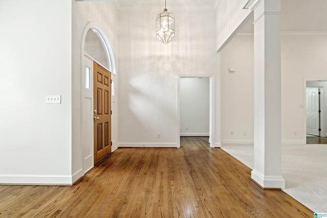 175 Sunhill Rd, Remlap, AL 35133 - entryway with a towering ceiling, baseboards, ornate columns, and wood finished floors