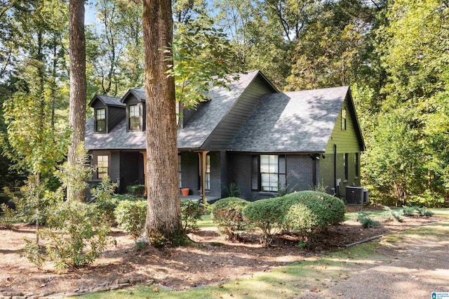 3400 Autumn Haze Ln, Birmingham, AL 35242 - view of front facade featuring central AC, a shingled roof, and brick siding