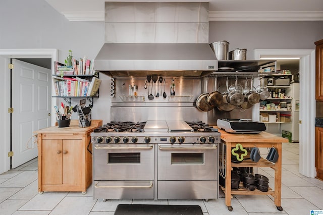 327 Ridgeview Lake Rd, Alabaster, AL 35007 - kitchen featuring double oven range, wall chimney range hood, ornamental molding, and light tile patterned floors