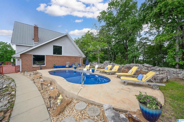 327 Ridgeview Lake Rd, Alabaster, AL 35007 - view of pool featuring a deck and a patio