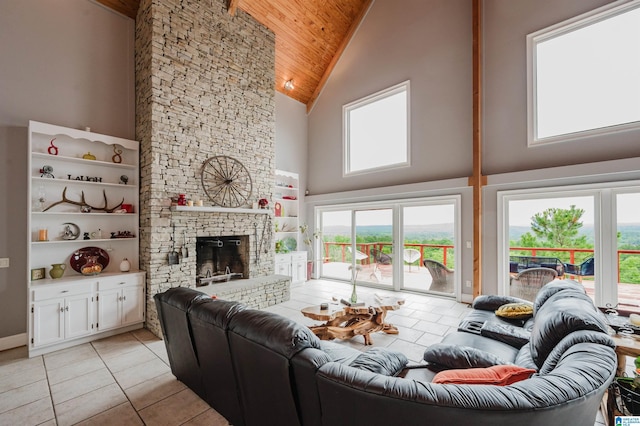 327 Ridgeview Lake Rd, Alabaster, AL 35007 - living area featuring high vaulted ceiling, wooden ceiling, light tile patterned floors, and a stone fireplace