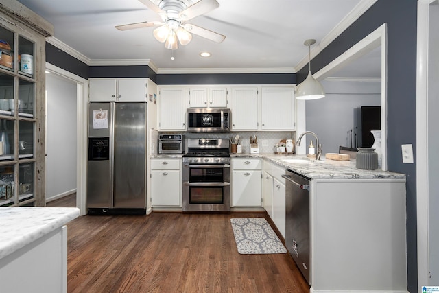 734 Crest Ln, Homewood, AL 35209 - kitchen featuring appliances with stainless steel finishes, a sink, ceiling fan, white cabinetry, and dark wood-style flooring