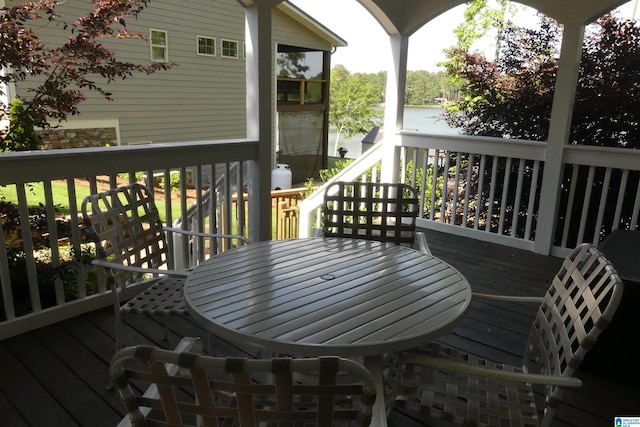 deck with outdoor dining space