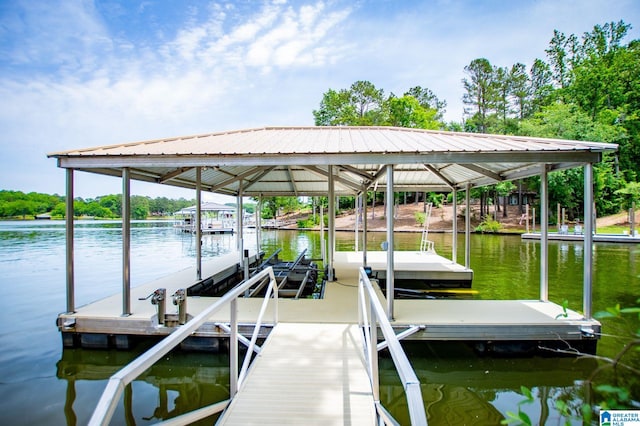 dock area featuring a water view and boat lift