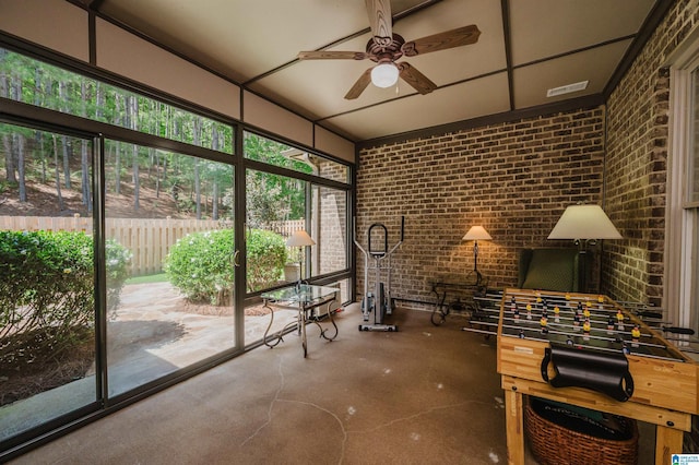 sunroom with ceiling fan