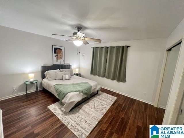 1329 31st St Unit C, Birmingham, AL 35205 - bedroom with baseboards, wood finished floors, ceiling fan, and a closet