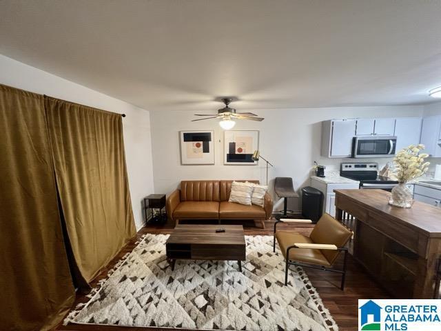 1329 31st St Unit C, Birmingham, AL 35205 - living area with wood finished floors and ceiling fan