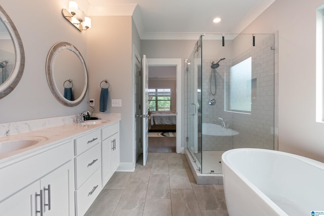 984 Knobloch Ln, Moody, AL 35004 - full bath with a stall shower, a freestanding tub, double vanity, ensuite bath, and recessed lighting