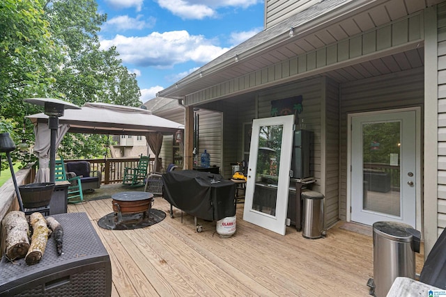 984 Knobloch Ln, Moody, AL 35004 - wooden deck with a gazebo, area for grilling, and a fire pit