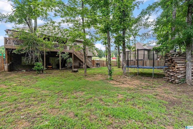 984 Knobloch Ln, Moody, AL 35004 - view of yard with stairway, a trampoline, and a wooden deck