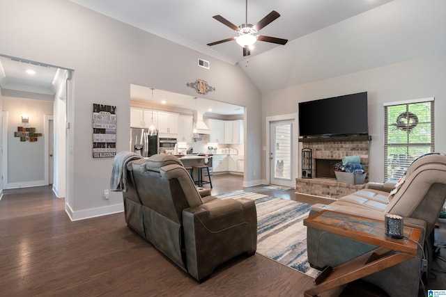984 Knobloch Ln, Moody, AL 35004 - living area with ceiling fan, baseboards, a brick fireplace, lofted ceiling, and ornamental molding