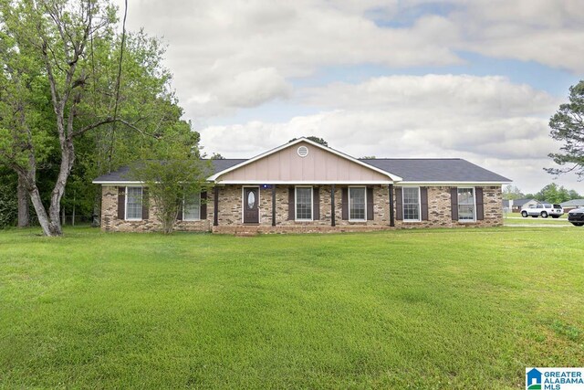 2996 Meadow St, Northport, AL 35475 - single story home with a front lawn and brick siding