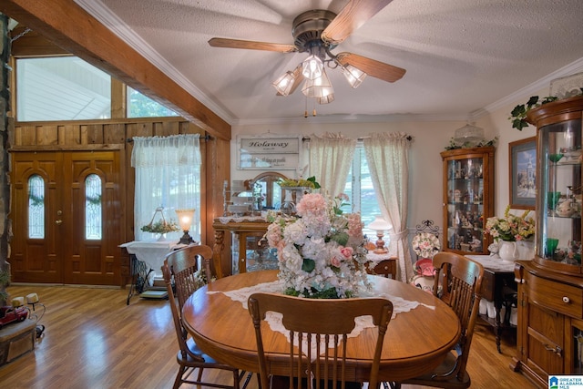 179 Idlewood Cir, Alexandria, AL 36250 - dining room with a ceiling fan, a textured ceiling, wood finished floors, and ornamental molding