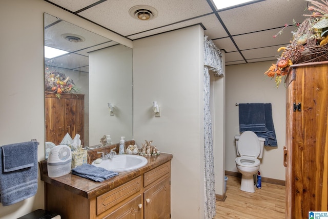 179 Idlewood Cir, Alexandria, AL 36250 - full bath with a drop ceiling, wood finished floors, toilet, vanity, and a shower with curtain