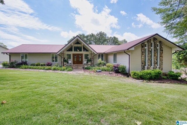 179 Idlewood Cir, Alexandria, AL 36250 - view of front facade with a front lawn and metal roof