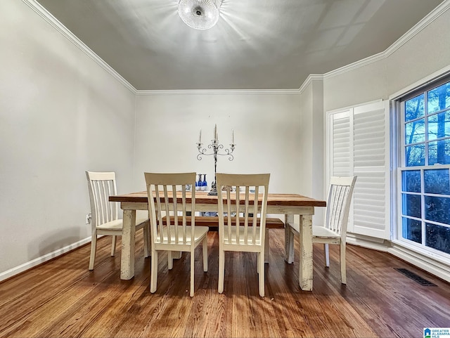 1851 Russet Woods Ln, Hoover, AL 35244 - dining area with wood finished floors, crown molding, and baseboards